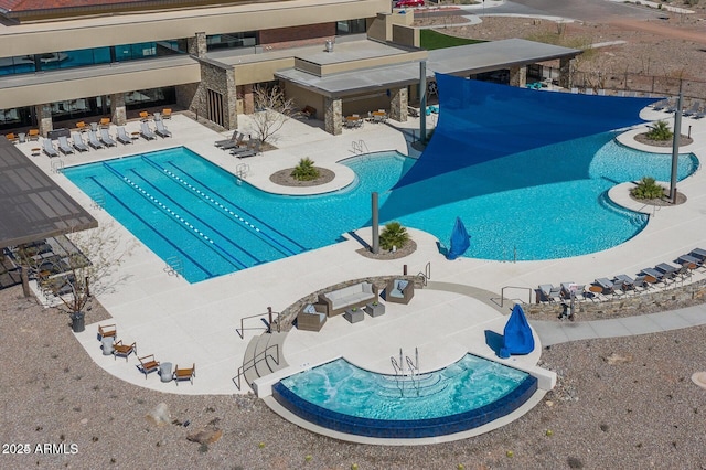 view of pool with a patio area