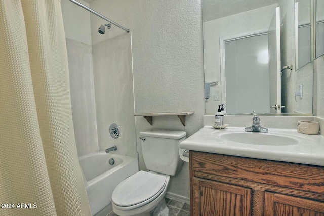 full bathroom featuring shower / bath combo, vanity, and toilet