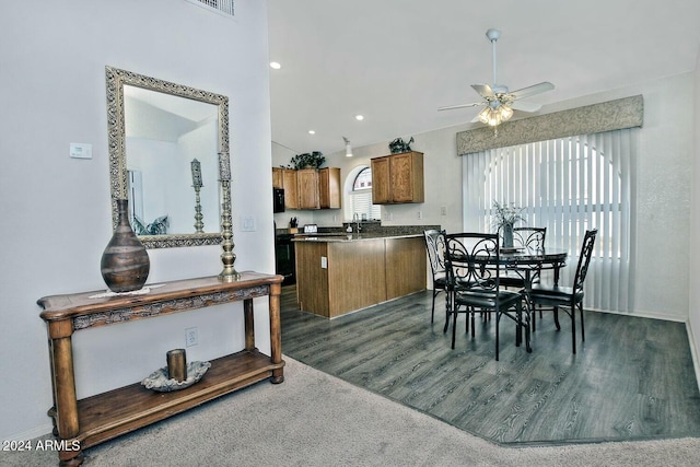 dining area featuring dark hardwood / wood-style floors and ceiling fan