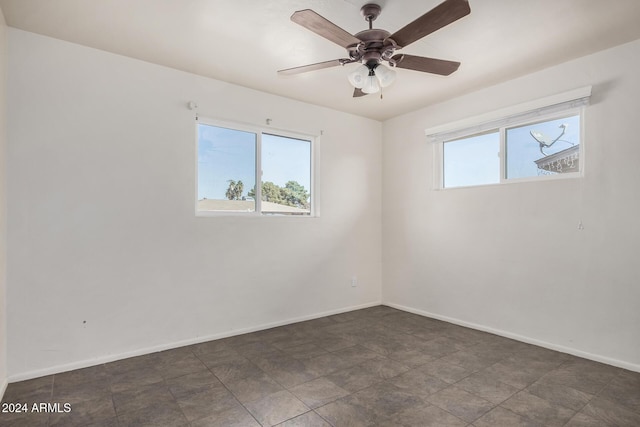 unfurnished room featuring ceiling fan