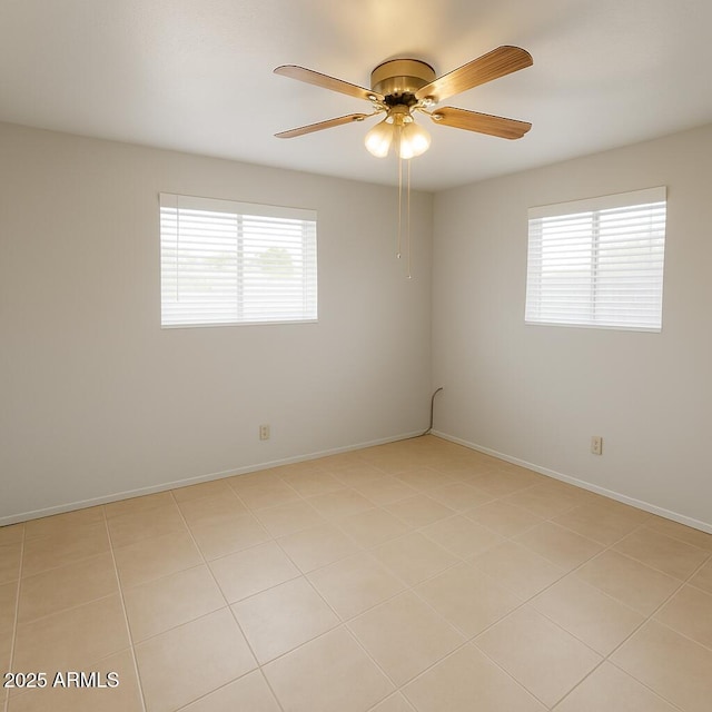 5342 E Des Moines St, Mesa, AZ 85205 - empty room featuring ceiling fan and baseboards
