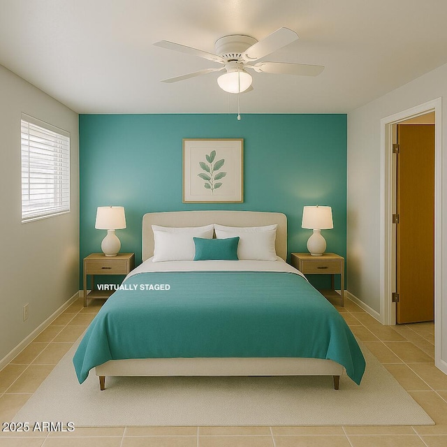 5342 E Des Moines St, Mesa, AZ 85205 - tiled bedroom featuring ceiling fan and baseboards