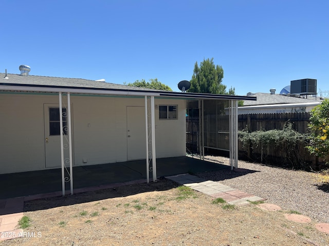 5342 E Des Moines St, Mesa, AZ 85205 - rear view of house with central AC and a patio