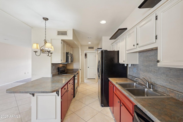 kitchen featuring pendant lighting, black appliances, white cabinets, sink, and light tile patterned floors