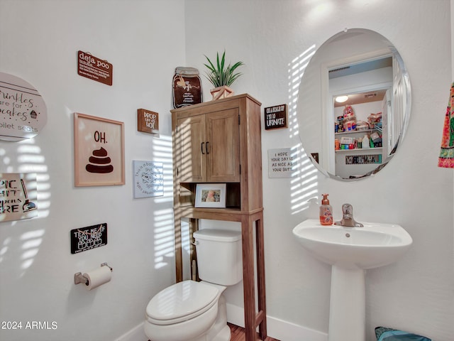 bathroom featuring toilet