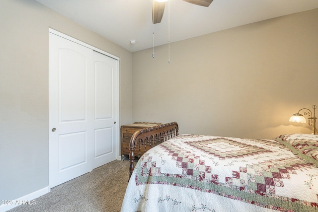 carpeted bedroom featuring baseboards and ceiling fan