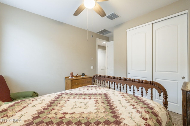 bedroom featuring a ceiling fan, visible vents, and a closet