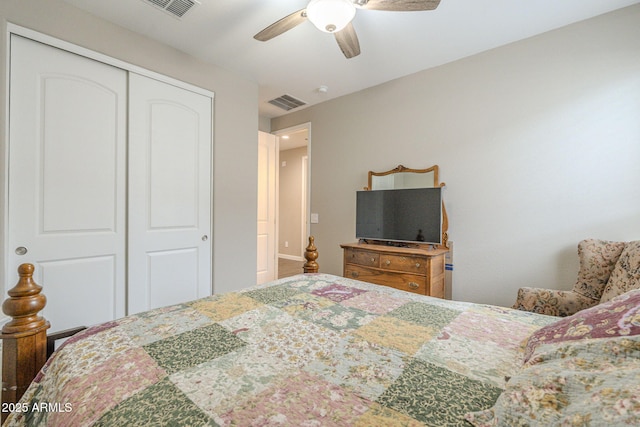 bedroom featuring a closet, visible vents, and a ceiling fan