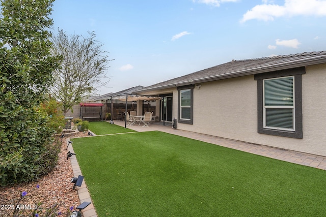 view of yard featuring a patio area and a fenced backyard