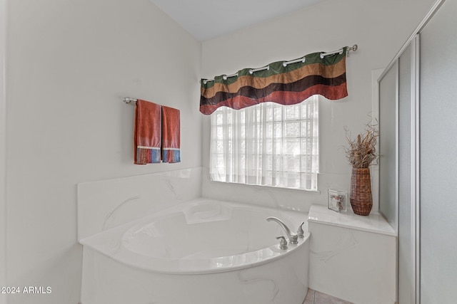 bathroom featuring a tub