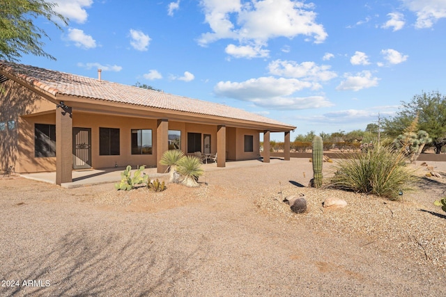 rear view of house with a patio area