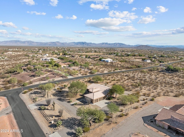 birds eye view of property featuring a mountain view