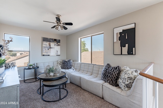 living room with carpet and ceiling fan