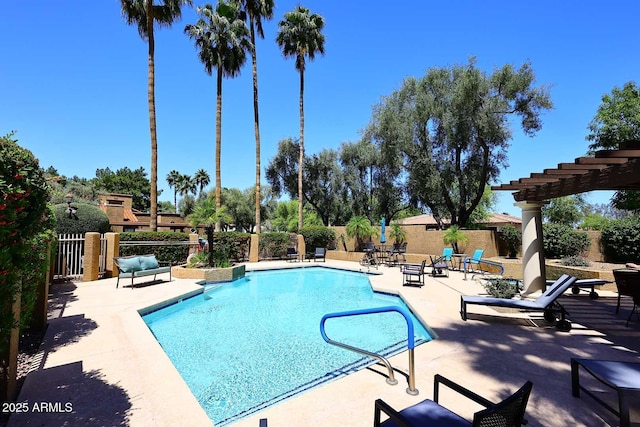 view of swimming pool featuring a fenced in pool, fence, a pergola, and a patio