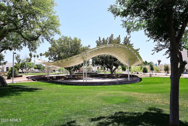 view of home's community featuring a lawn