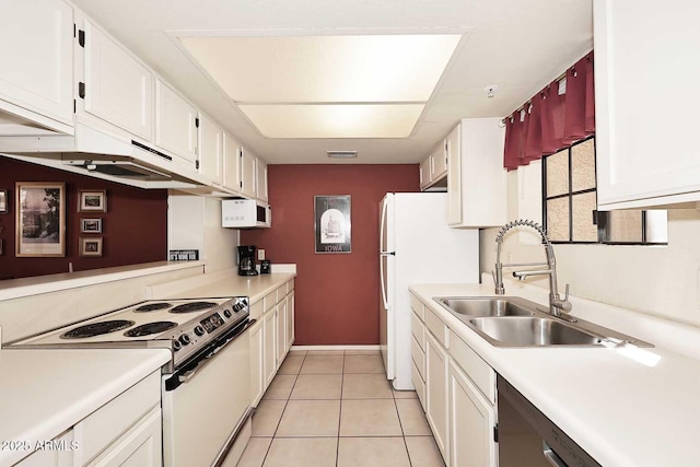 kitchen featuring visible vents, white appliances, light countertops, white cabinets, and a sink
