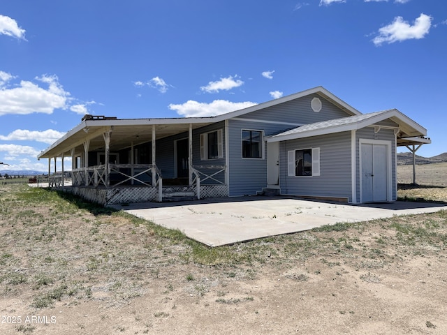 2995 W Rd 1 S, Chino Valley, AZ 86323 - back of property with a patio area and covered porch