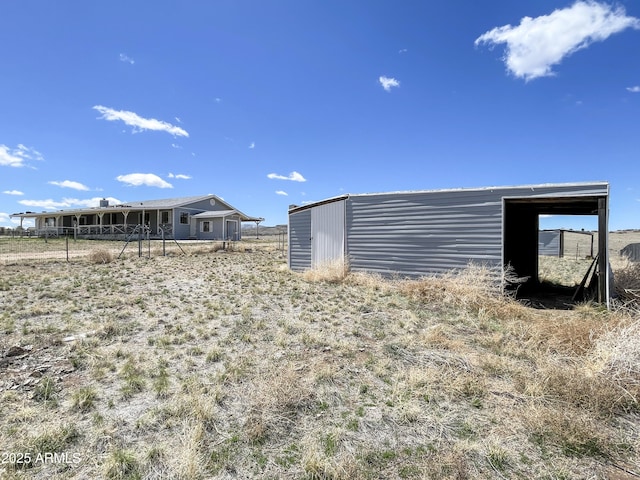 2995 W Rd 1 S, Chino Valley, AZ 86323 - view of yard featuring a pole building and an outbuilding