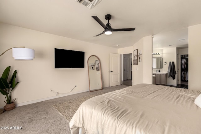 1421 E Charleston Ave, Phoenix, AZ 85022 - carpeted bedroom with ensuite bath, baseboards, and a ceiling fan
