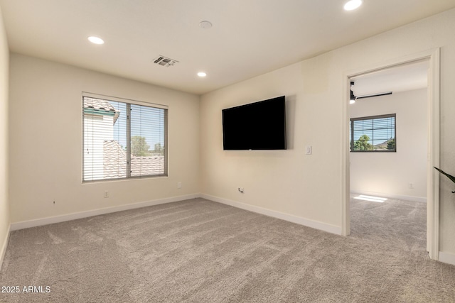 1421 E Charleston Ave, Phoenix, AZ 85022 - carpeted empty room with recessed lighting and baseboards