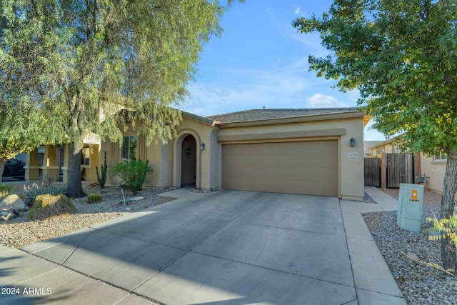 view of front of property with a garage