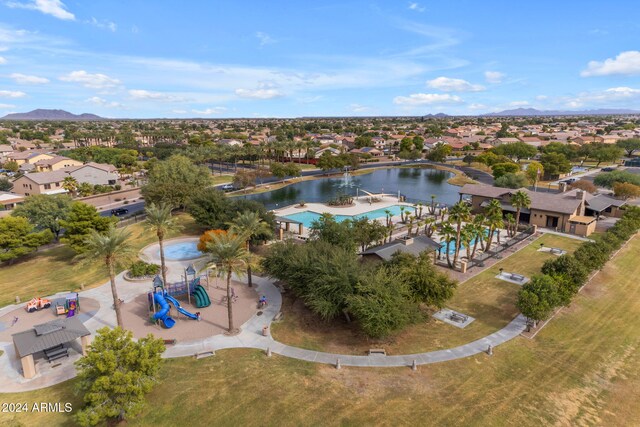 44395 W Bailey Dr, Maricopa, AZ 85138 - aerial perspective of suburban area with a pool and a mountain backdrop