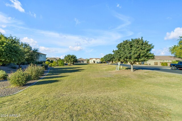 44395 W Bailey Dr, Maricopa, AZ 85138 - view of grassy yard featuring a residential view