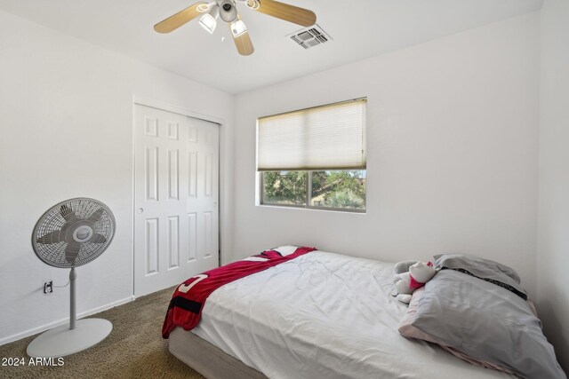 bedroom featuring ceiling fan and carpet flooring