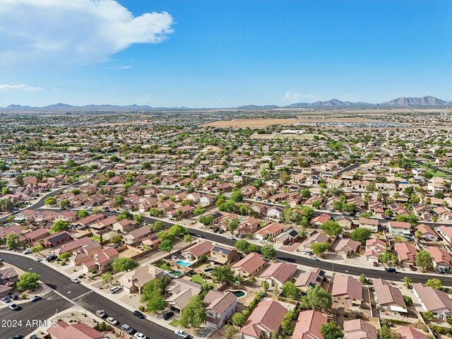 drone / aerial view featuring a mountain view