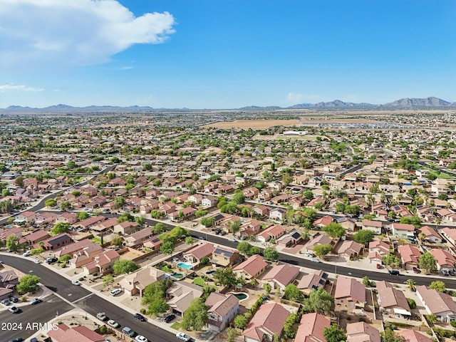 birds eye view of property featuring a residential view and a mountain view