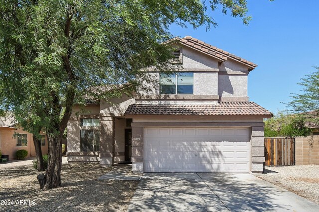 view of property featuring a garage