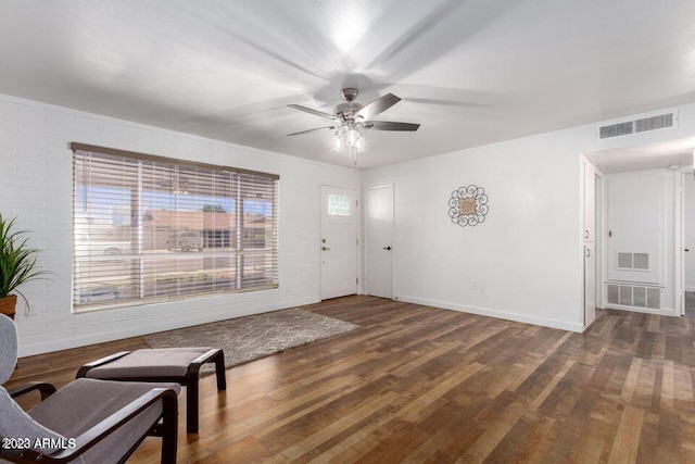 entrance foyer featuring dark hardwood / wood-style floors and ceiling fan