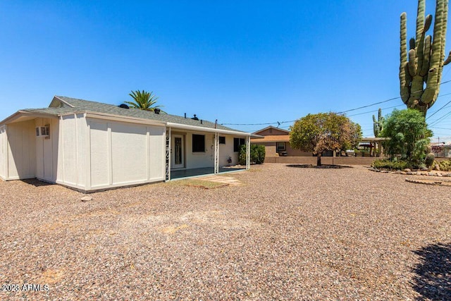 back of house with a patio area