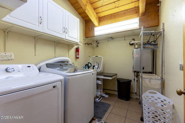 4893 W Big Pine Dr, Lakeside, AZ 85929 - laundry room with independent washer and dryer, wooden ceiling, light tile patterned flooring, and cabinet space