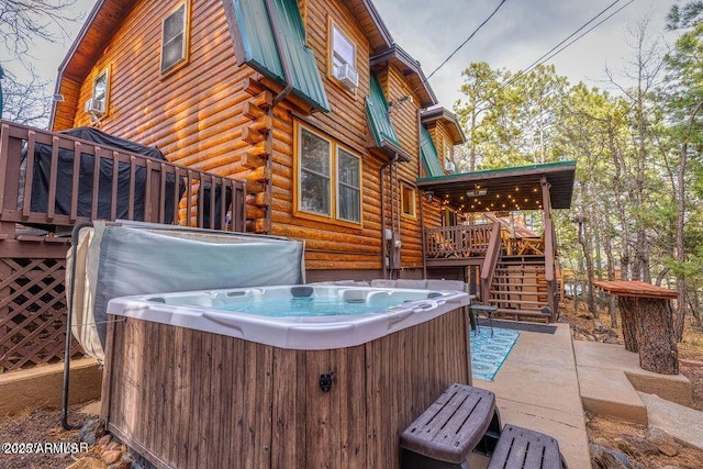 4893 W Big Pine Dr, Lakeside, AZ 85929 - view of patio with stairway, a wooden deck, and a hot tub