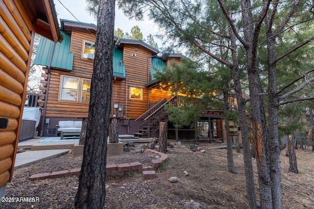 4893 W Big Pine Dr, Lakeside, AZ 85929 - back of property featuring stairs, a patio, and log veneer siding