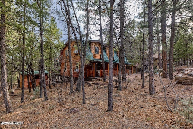 4893 W Big Pine Dr, Lakeside, AZ 85929 - exterior space with faux log siding and covered porch