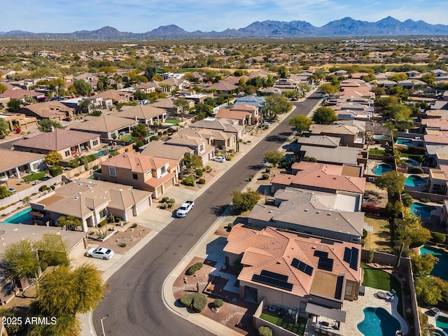 drone / aerial view featuring a mountain view