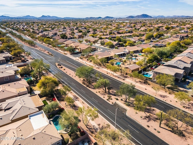 drone / aerial view featuring a mountain view