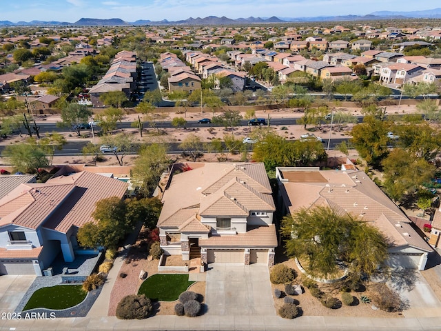 drone / aerial view featuring a mountain view