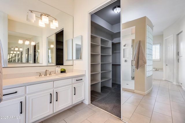 bathroom with vanity and tile patterned floors