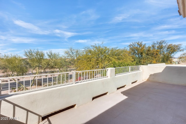 view of patio with a balcony