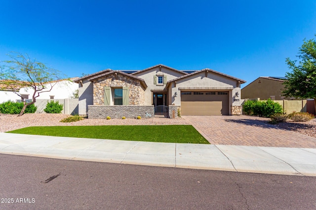 single story home featuring fence, stone siding, a garage, and stucco siding