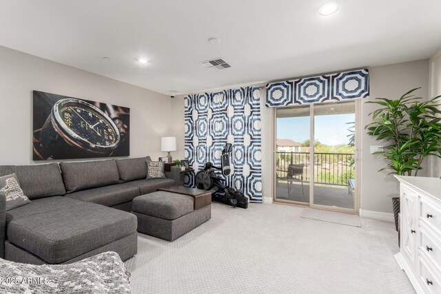 living room with light carpet, recessed lighting, visible vents, and baseboards