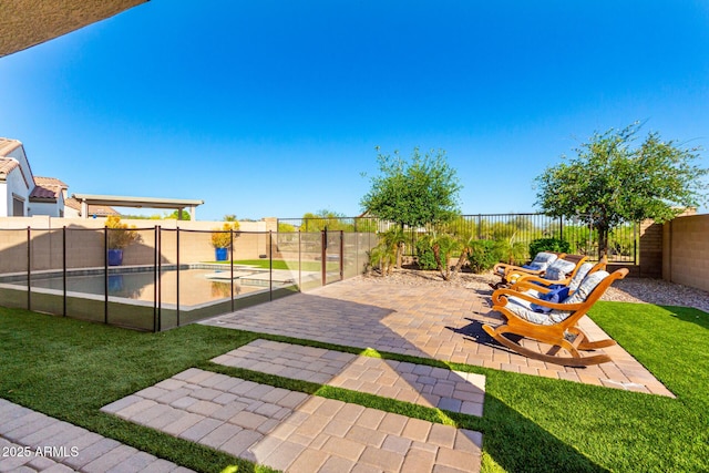 view of patio with a fenced backyard and a fenced in pool