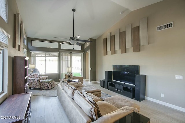 living room with ceiling fan and light wood-type flooring