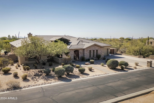 view of front of home with a garage