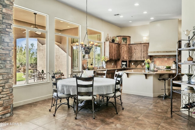 dining area with a chandelier