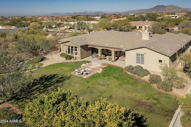 drone / aerial view featuring a mountain view