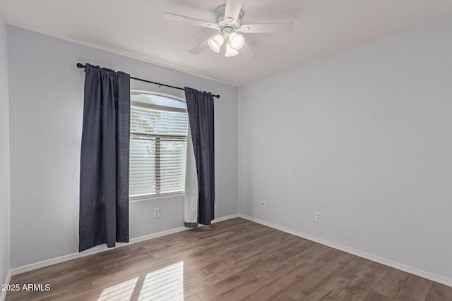 spare room featuring ceiling fan and wood-type flooring